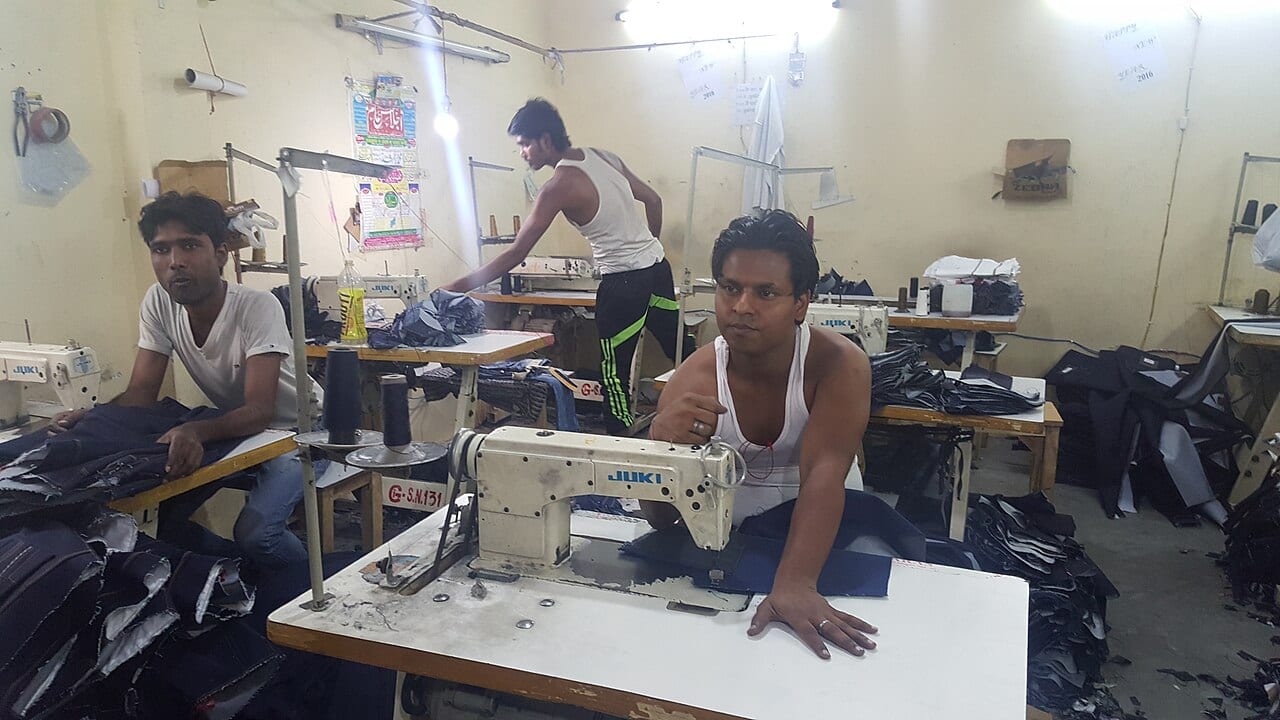 Tailors at work in Karawal Nagar, Delhi
