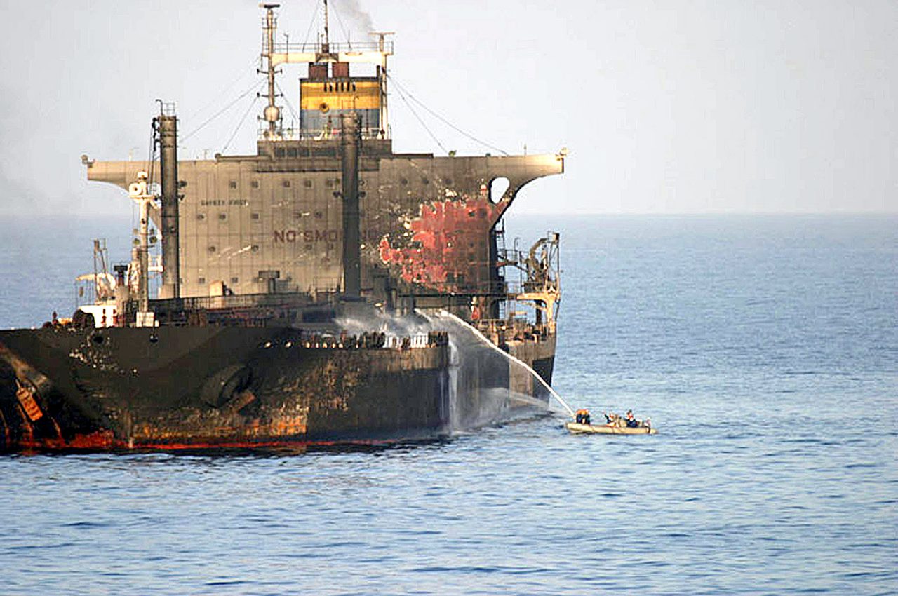 File photo: a crude oil tanker on fire at sea (2004)