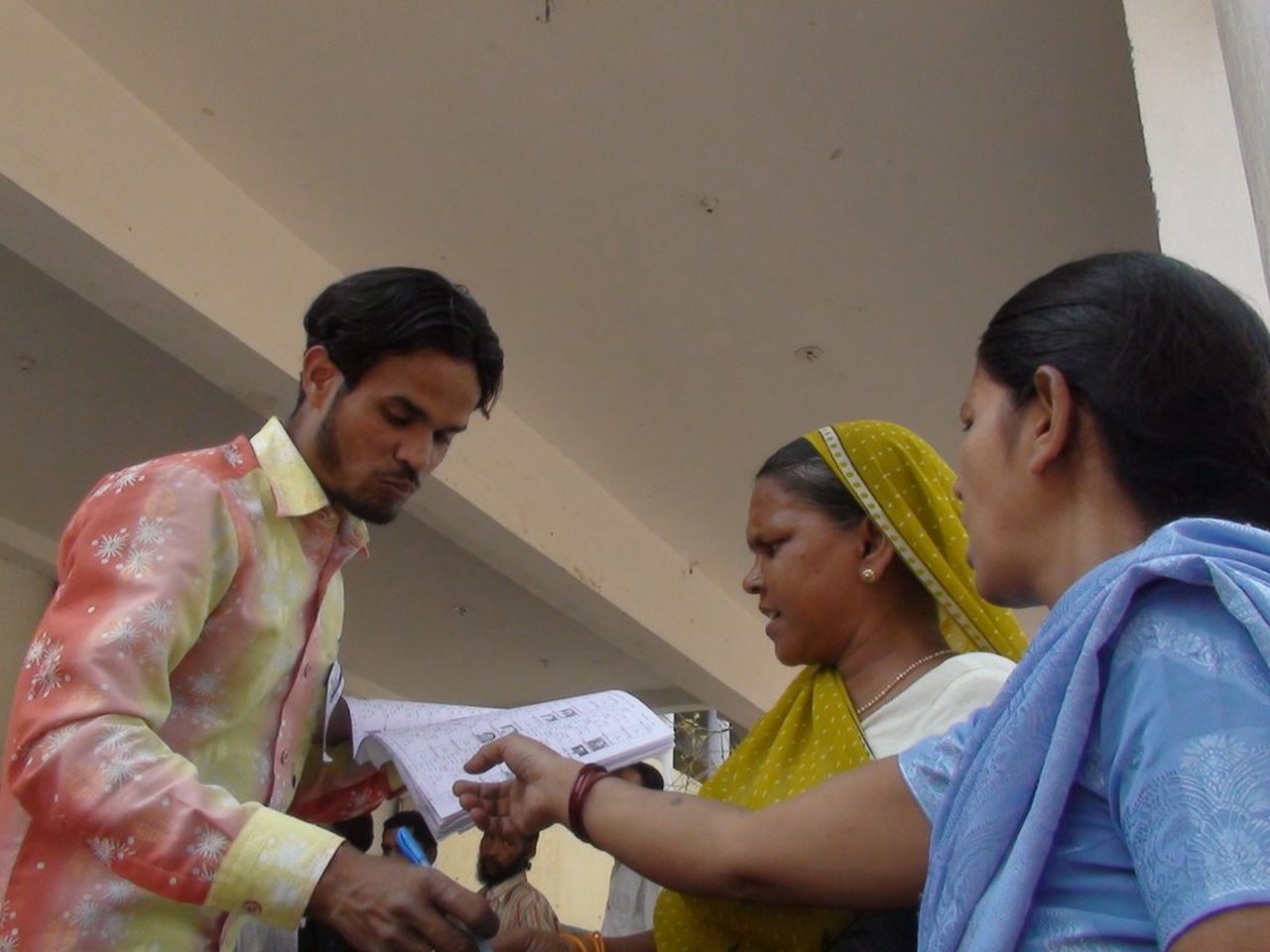 A booth level officer carrying enumeration forms during the Special Intensive Revision
