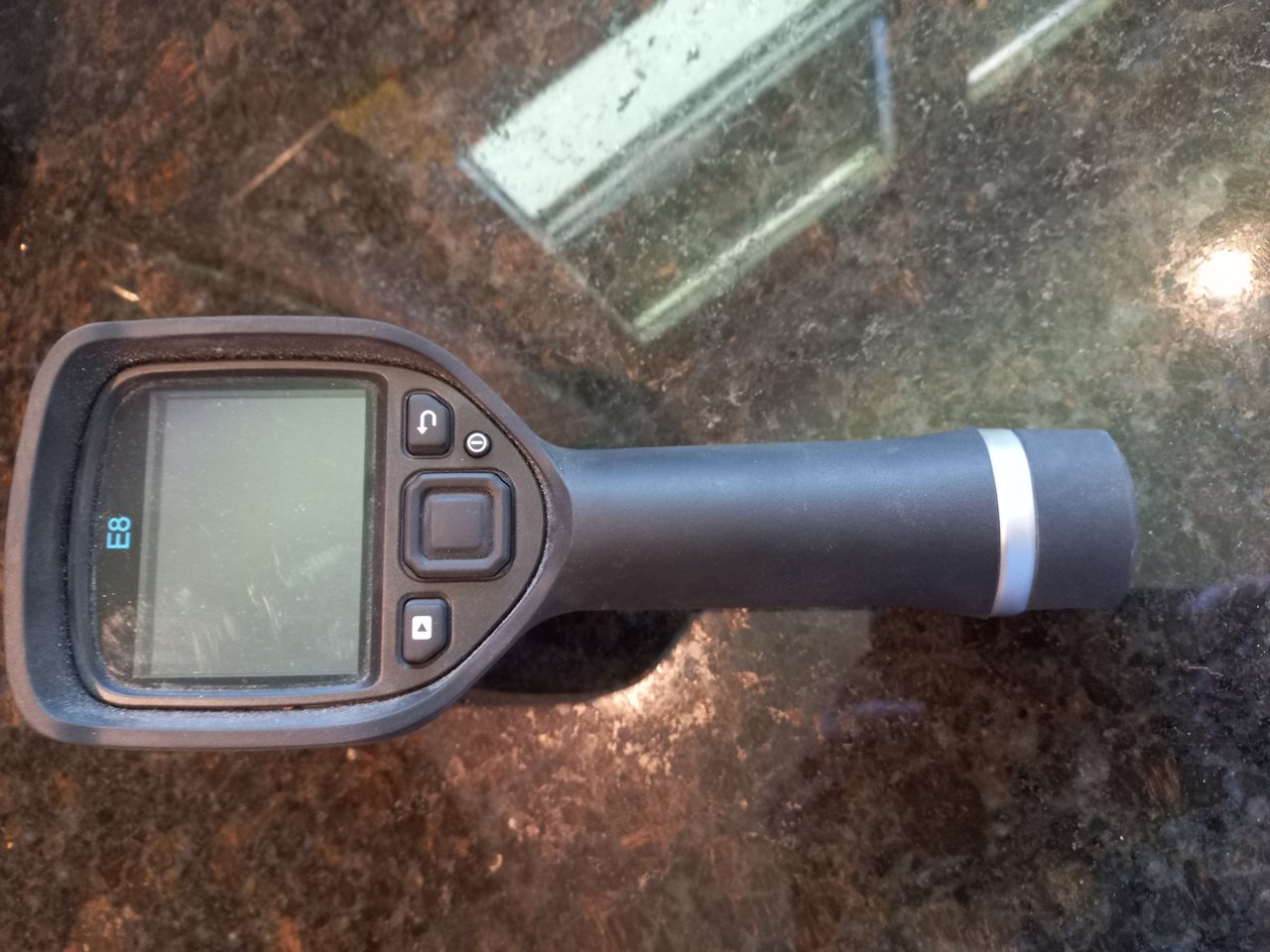 A handheld thermal imaging camera